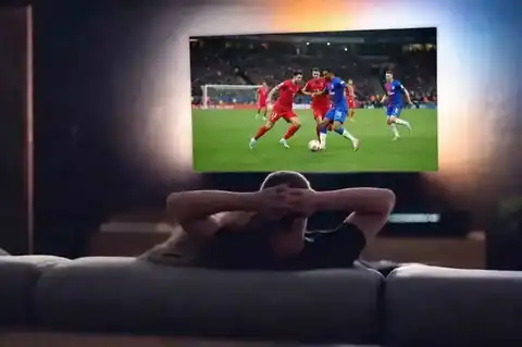 Irish viewer enjoying GAA IPTV Ireland streaming service on a large screen TV